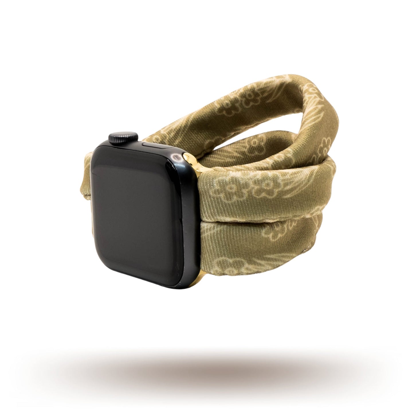 Amber Blossoms Yoga Band® featuring a delicate orange and white floral pattern on a soft fabric background. This breathable, patent-pending design is a stretchy handcrafted watch strap compatible with Apple Watch, Fitbit, and Samsung Galaxy
