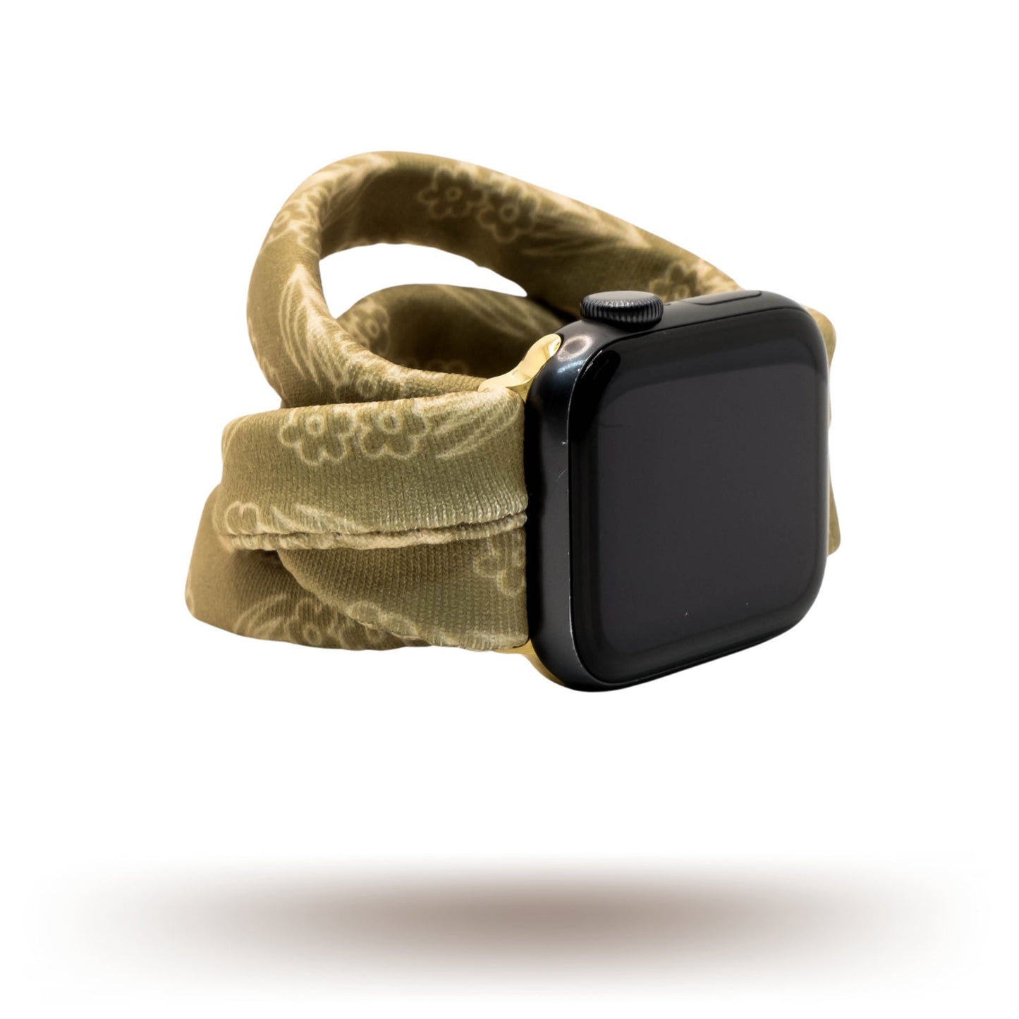Amber Blossoms Yoga Band® featuring a delicate orange and white floral pattern on a soft fabric background. This breathable, patent-pending design is a stretchy handcrafted watch strap compatible with Apple Watch, Fitbit, and Samsung Galaxy