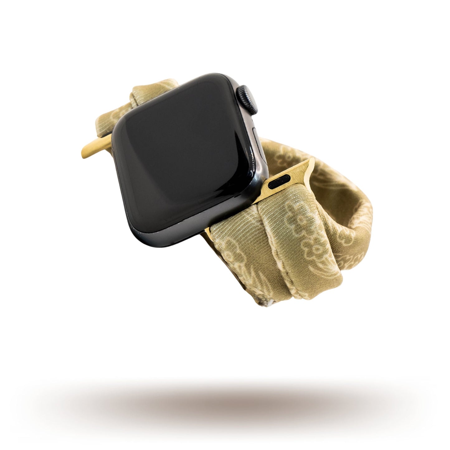 Amber Blossoms Yoga Band® featuring a delicate orange and white floral pattern on a soft fabric background. This breathable, patent-pending design is a stretchy handcrafted watch strap compatible with Apple Watch, Fitbit, and Samsung Galaxy