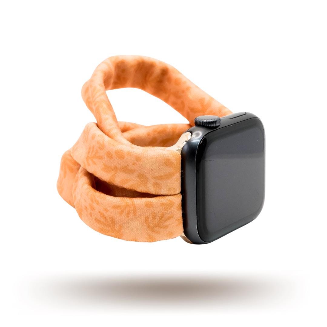 Autumn Orange Yoga Band® shown in a rich burnt orange fabric. This breathable, stretchy handcrafted watch strap is compatible with Apple Watch, Fitbit, and Samsung Galaxy models.