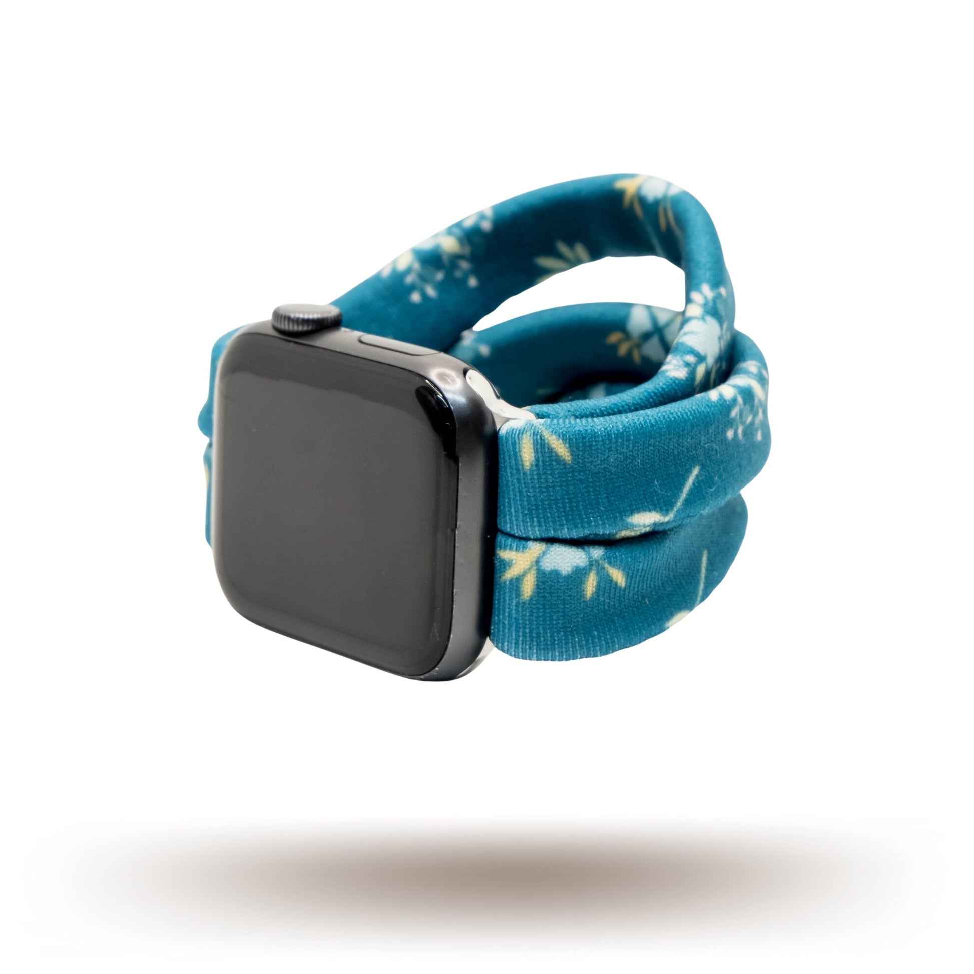 Azure Garden Yoga Band® featuring a blue floral print on a light fabric background. This breathable, stretchy handcrafted watch strap is compatible with Apple Watch, Fitbit, and Samsung Galaxy models.