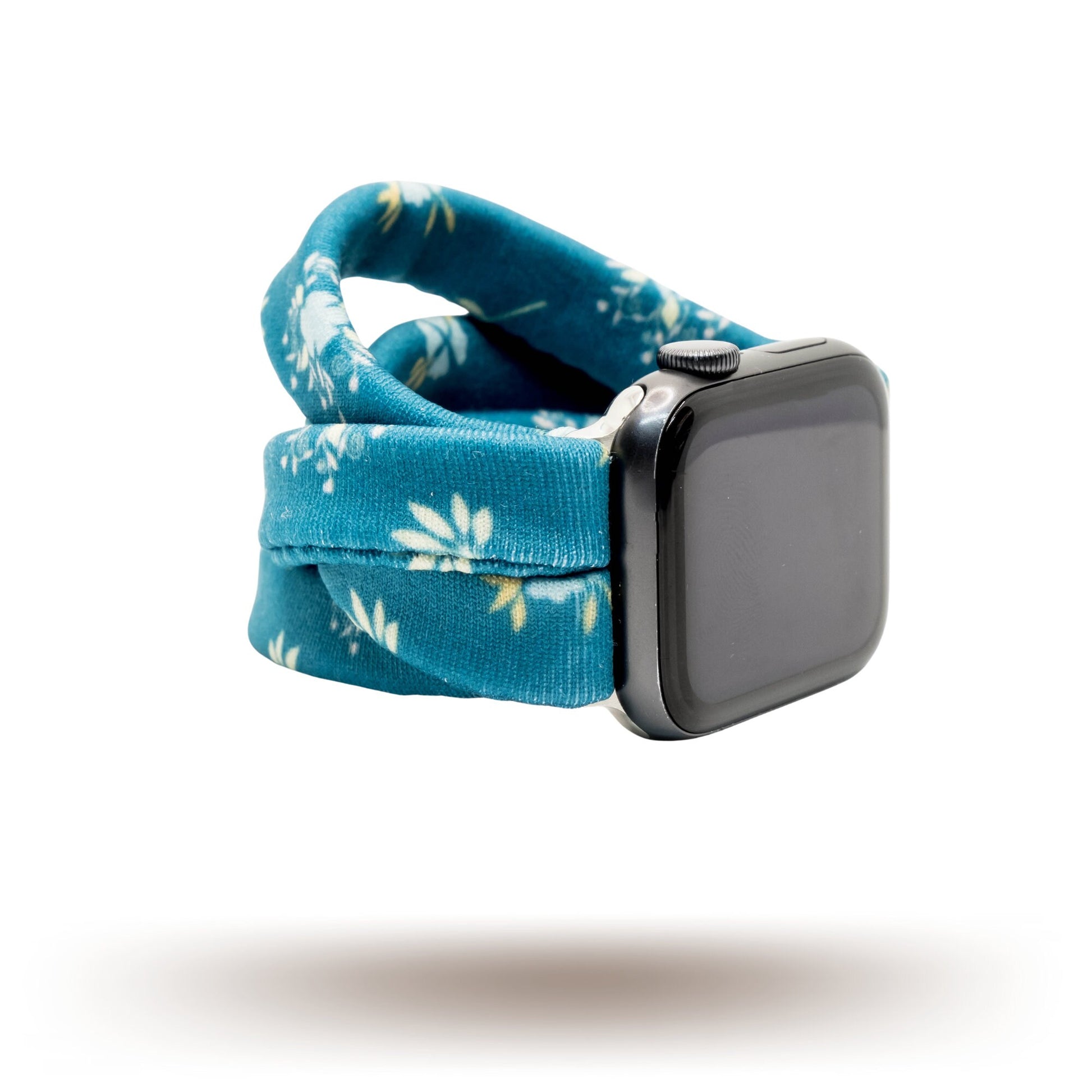 Azure Garden Yoga Band® featuring a blue floral print on a light fabric background. This breathable, stretchy handcrafted watch strap is compatible with Apple Watch, Fitbit, and Samsung Galaxy models.