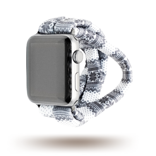 Black Nordic Sweater Yoga Band® featuring a black and white Fair Isle sweater print. This breathable, stretchy watch strap with a patent-pending design is compatible with Apple Watch, Fitbit, and Samsung Galaxy.