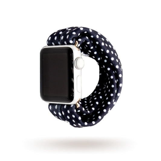 Black Polka Dot Yoga Band® featuring a white polka dot pattern on black fabric. This breathable, stretchy watch strap with a patent-pending design is compatible with Apple Watch, Fitbit, and Samsung Galaxy.