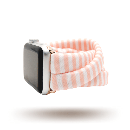 Blush Mini-Stripes Yoga Band® featuring a pink and white thin striped pattern. A breathable, stretchy watch strap with a patent-pending design compatible with Apple Watch, Fitbit, and Samsung Galaxy models.