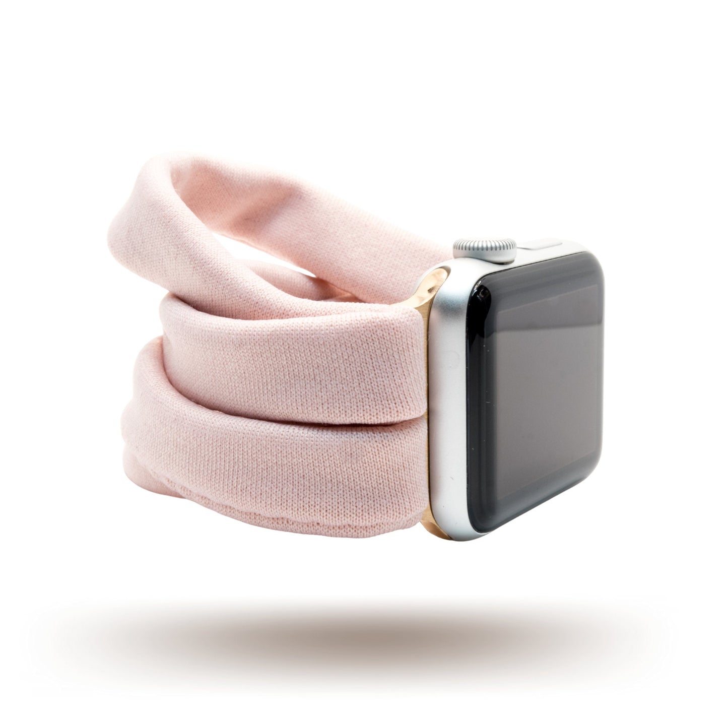 Blush Pink Yoga Band® in a solid pale pink knit fabric. A breathable, stretchy watch strap with a patent-pending design compatible with Apple Watch, Fitbit, and Samsung Galaxy models.