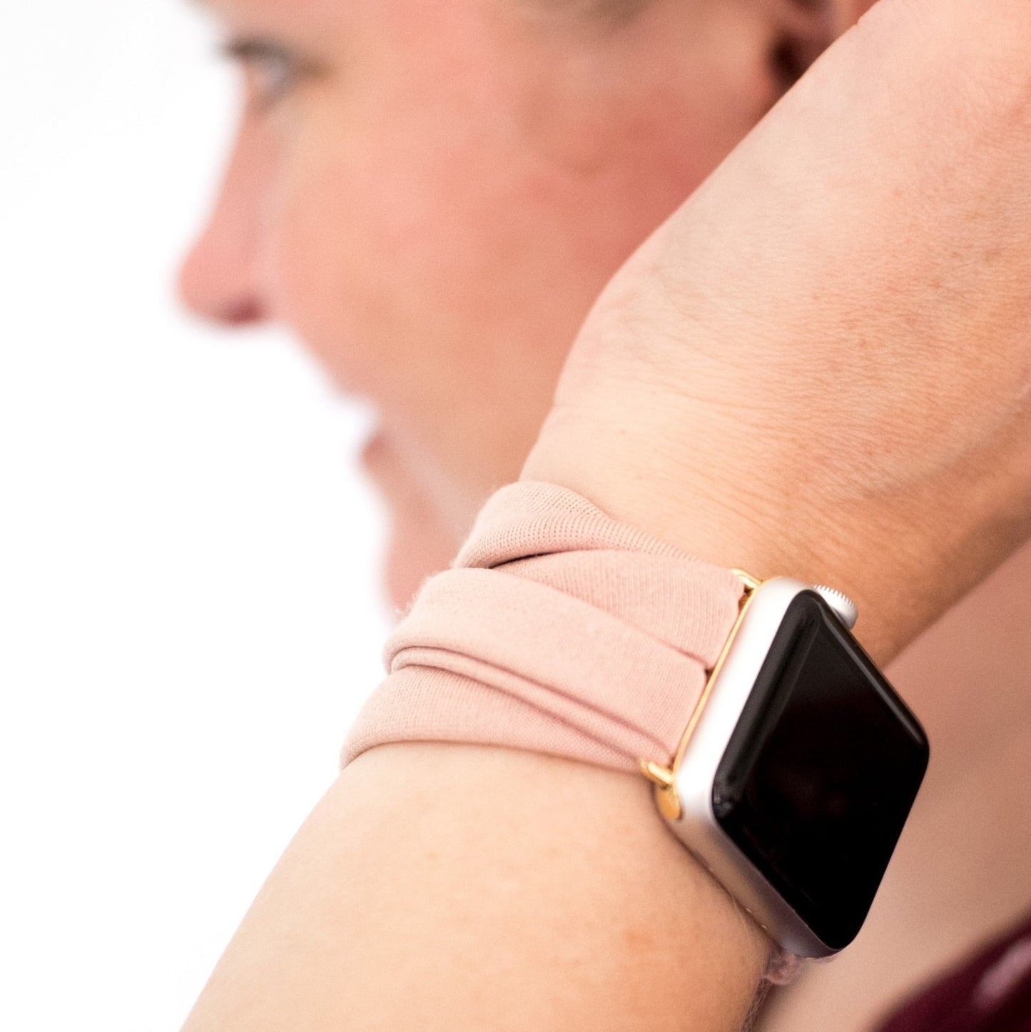 Blush Pink Yoga Band® in a solid pale pink knit fabric. A breathable, stretchy watch strap with a patent-pending design compatible with Apple Watch, Fitbit, and Samsung Galaxy models.