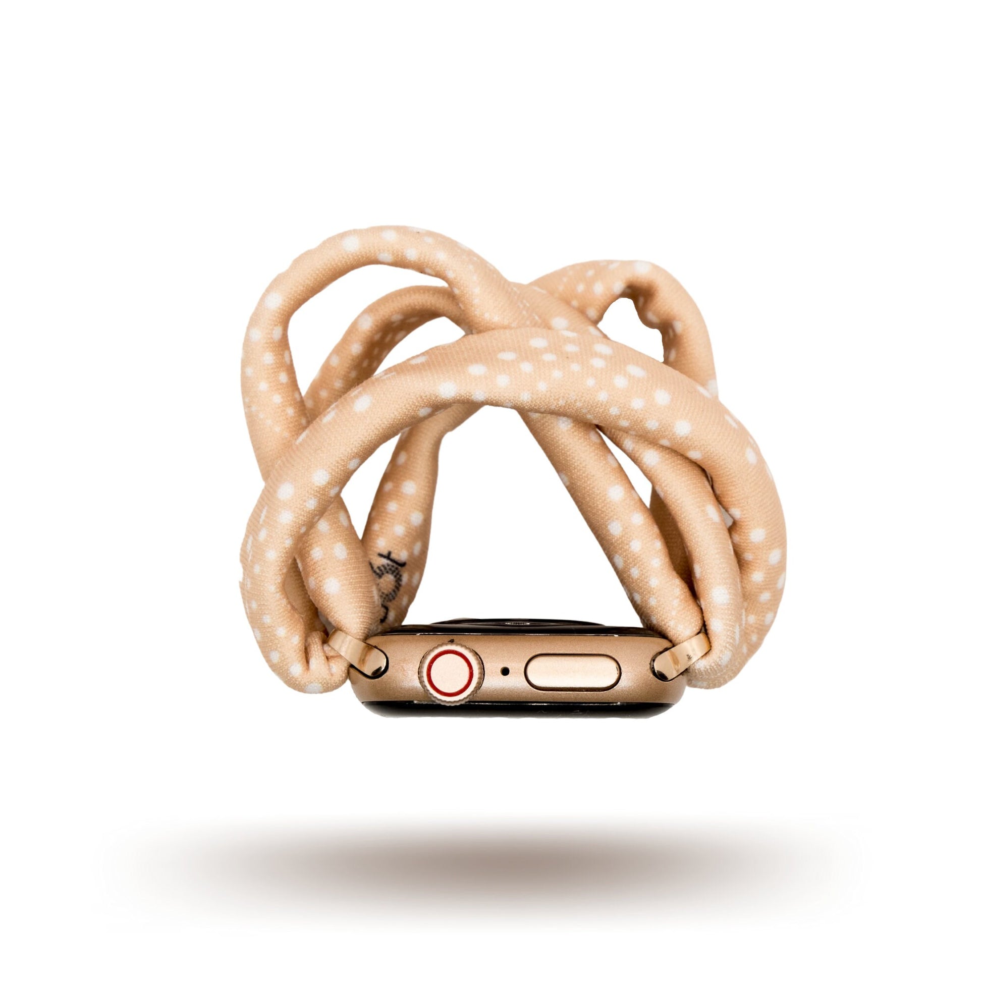 Blush Southwest Dots Yoga Band® featuring a light pink and white dotted southwestern pattern. A breathable, stretchy watch strap with a patent-pending design compatible with Apple Watch, Fitbit, and Samsung Galaxy models.