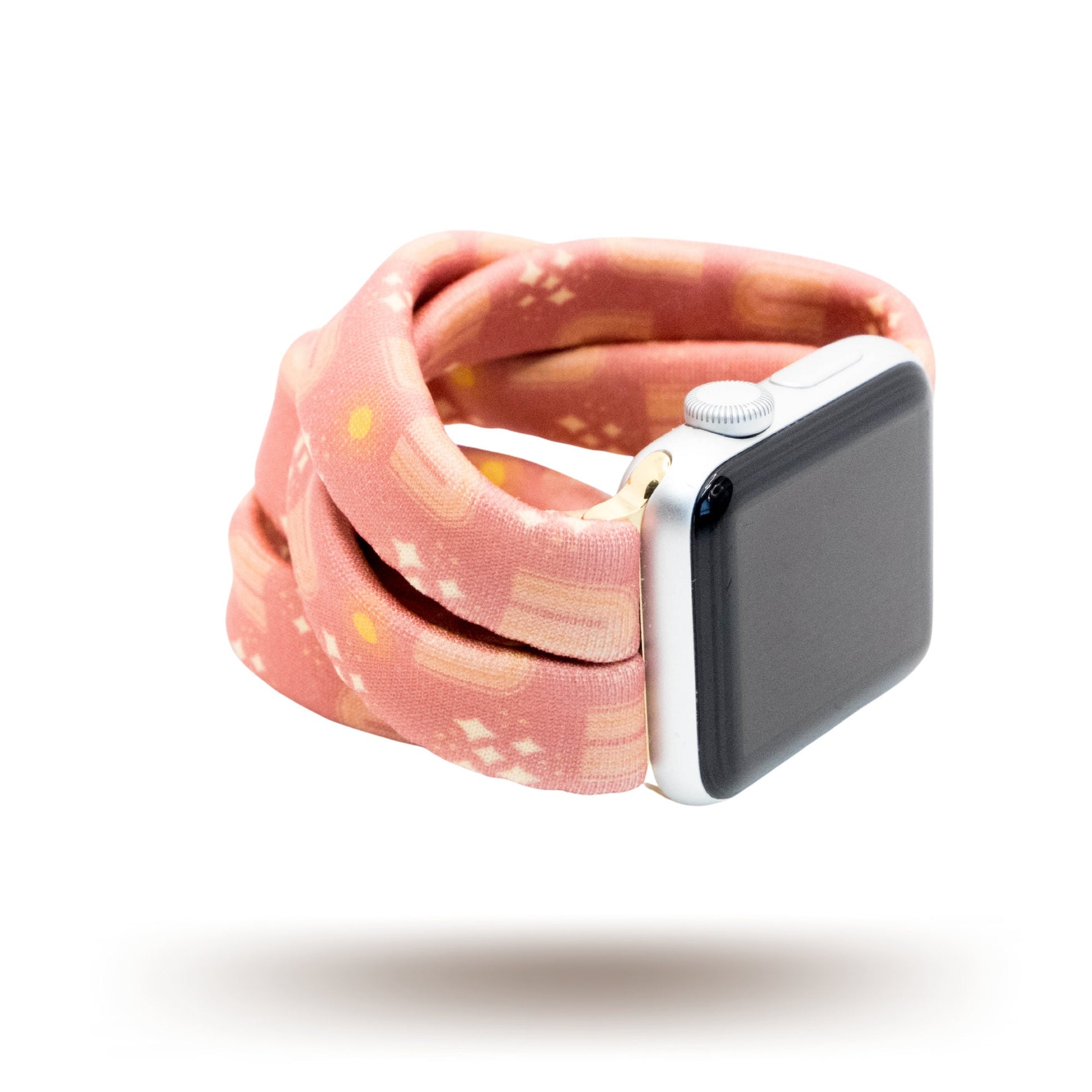 Bohemian Glow Yoga Band® featuring a vibrant yellow boho pattern on a red fabric background. This breathable, stretchy watch strap with a patent-pending design is compatible with Apple Watch, Fitbit, and Samsung Galaxy models.