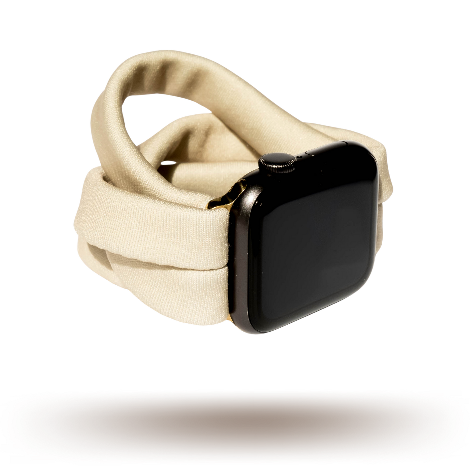 British Khaki Yoga Band® in a solid tan knit fabric. A breathable, stretchy watch strap with a patent-pending design compatible with Apple Watch, Fitbit, and Samsung Galaxy models.