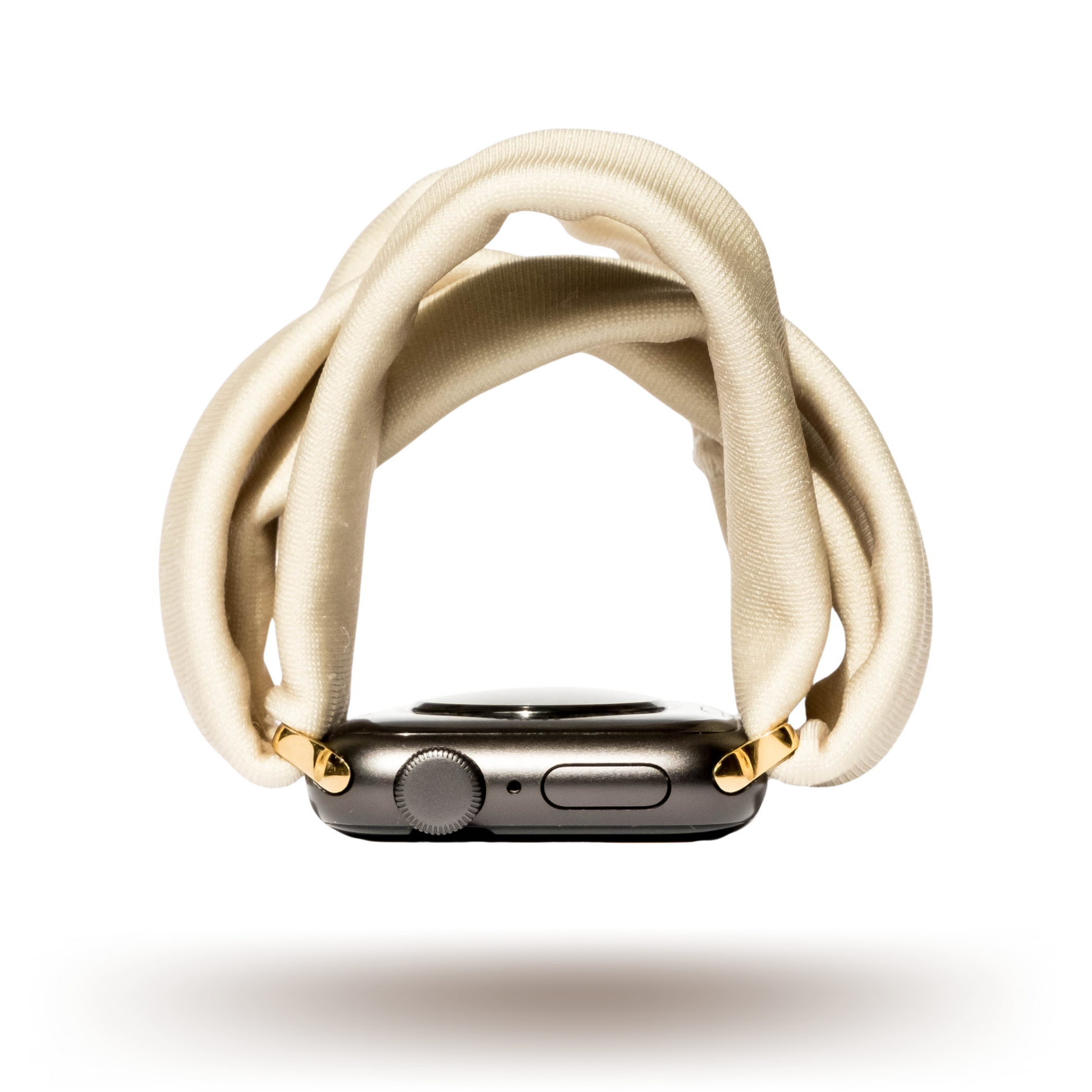 British Khaki Yoga Band® in a solid tan knit fabric. A breathable, stretchy watch strap with a patent-pending design compatible with Apple Watch, Fitbit, and Samsung Galaxy models.