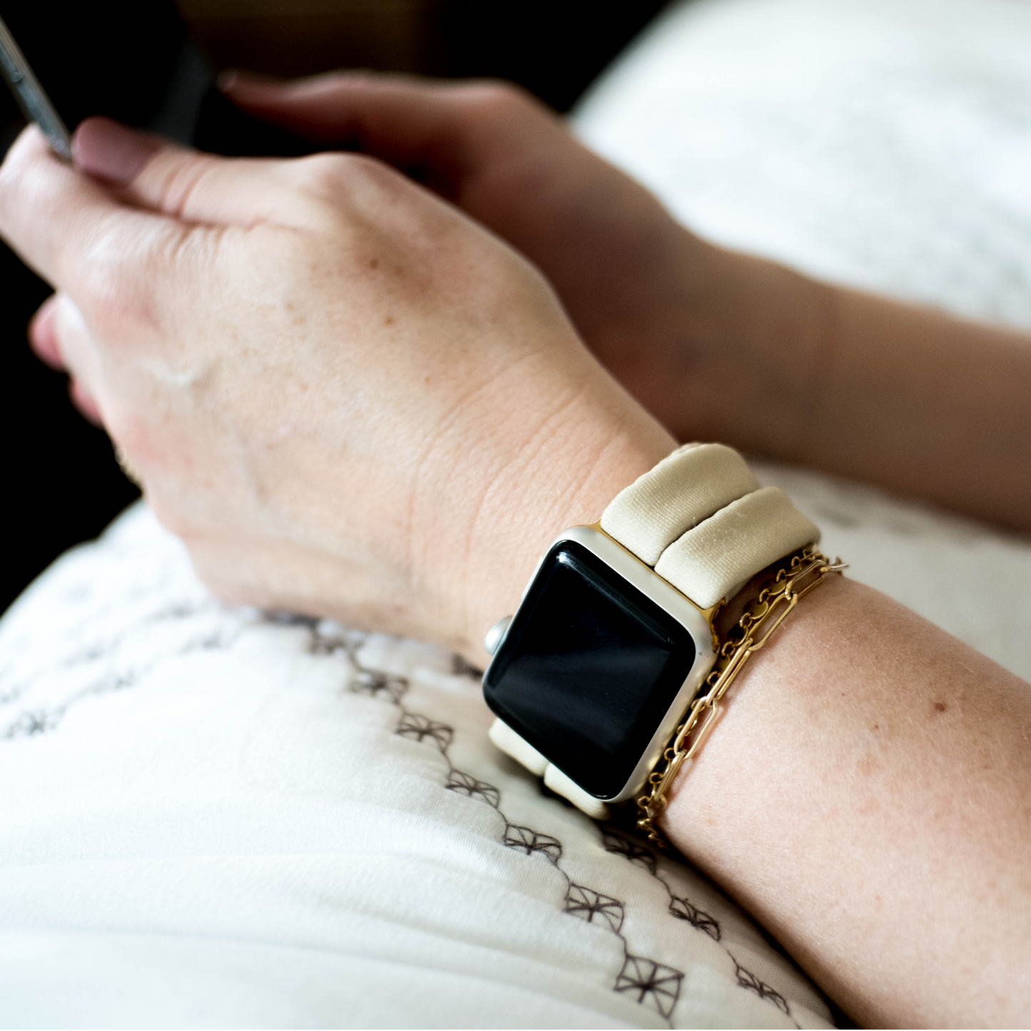 British Khaki Yoga Band® in a solid tan knit fabric. A breathable, stretchy watch strap with a patent-pending design compatible with Apple Watch, Fitbit, and Samsung Galaxy models.