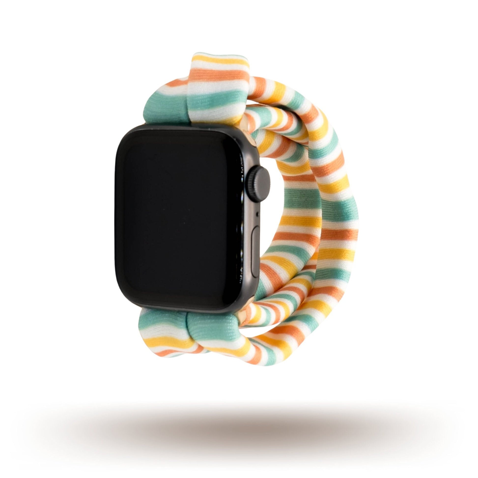 Citrus Stripes Yoga Band® featuring bright yellow, orange, and teal stripes. A breathable, stretchy watch strap with a patent-pending design compatible with Apple Watch, Fitbit, and Samsung Galaxy models.