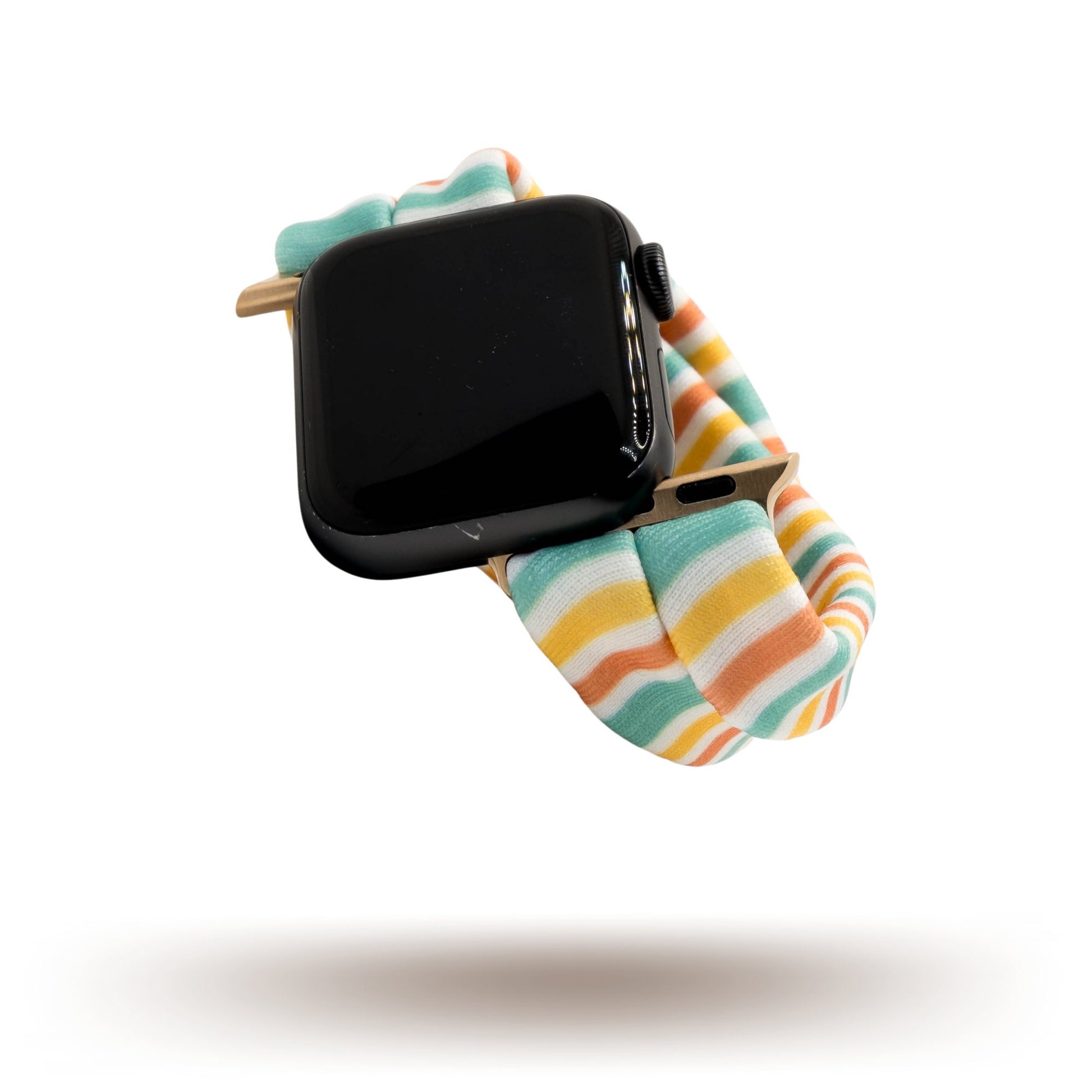 Citrus Stripes Yoga Band® featuring bright yellow, orange, and teal stripes. A breathable, stretchy watch strap with a patent-pending design compatible with Apple Watch, Fitbit, and Samsung Galaxy models.