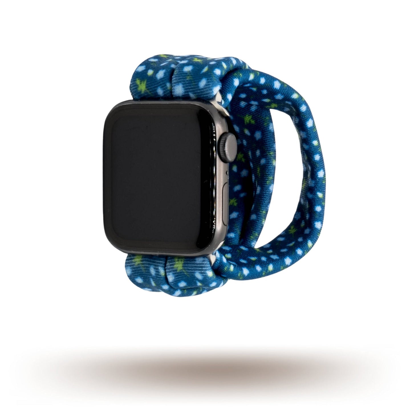 Cobalt Vineyard Yoga Band® featuring a blue and green vine print on a deep cobalt blue fabric. A breathable, stretchy watch strap with a patent-pending design compatible with Apple Watch, Fitbit, and Samsung Galaxy models.