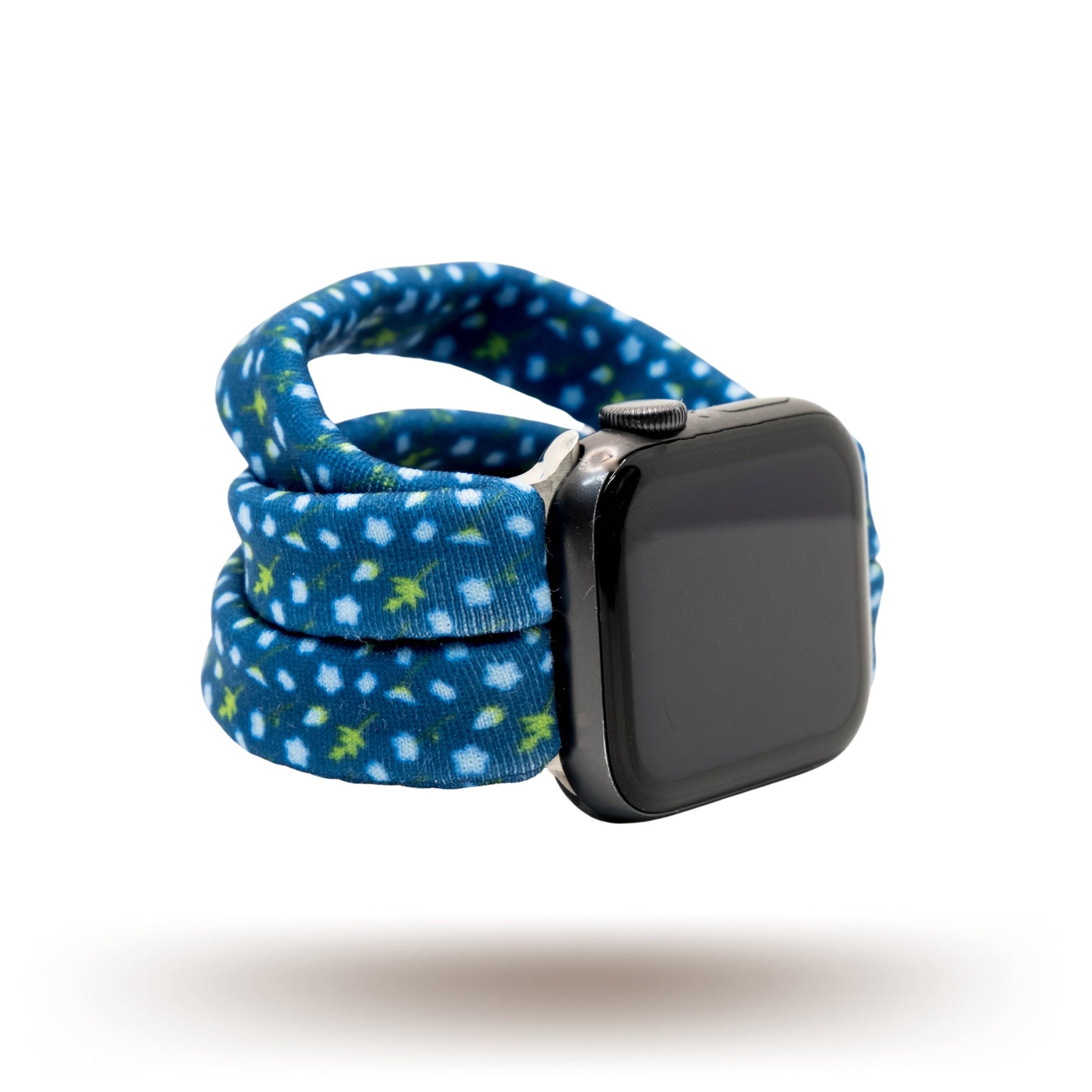 Cobalt Vineyard Yoga Band® featuring a blue and green vine print on a deep cobalt blue fabric. A breathable, stretchy watch strap with a patent-pending design compatible with Apple Watch, Fitbit, and Samsung Galaxy models.