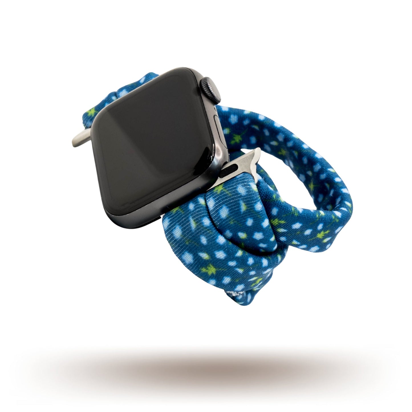 Cobalt Vineyard Yoga Band® featuring a blue and green vine print on a deep cobalt blue fabric. A breathable, stretchy watch strap with a patent-pending design compatible with Apple Watch, Fitbit, and Samsung Galaxy models.