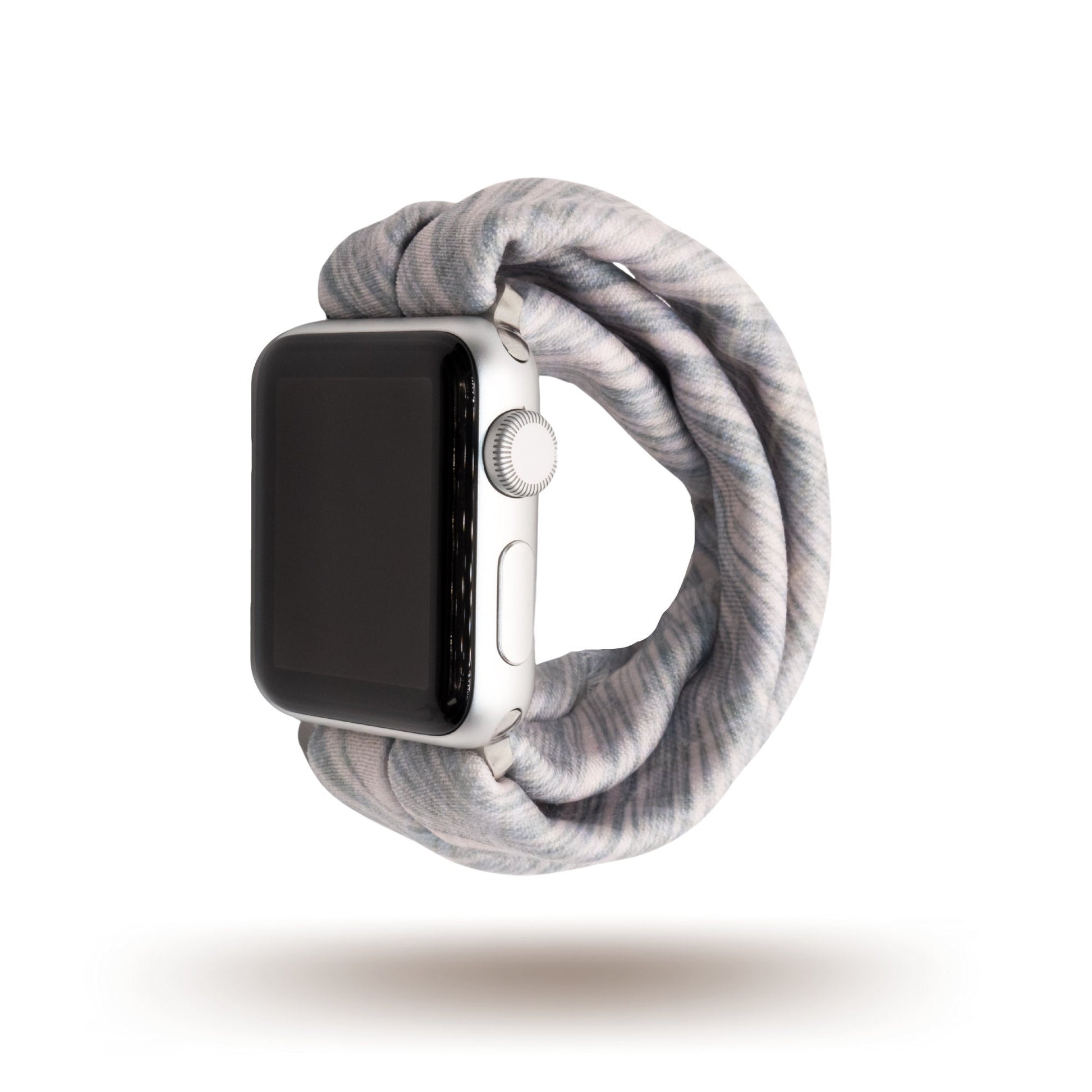 Crosshatch Pink Yoga Band® featuring a subtle crosshatch pattern on light pink fabric. A breathable, stretchy watch strap with a patent-pending design compatible with Apple Watch, Fitbit, and Samsung Galaxy models.