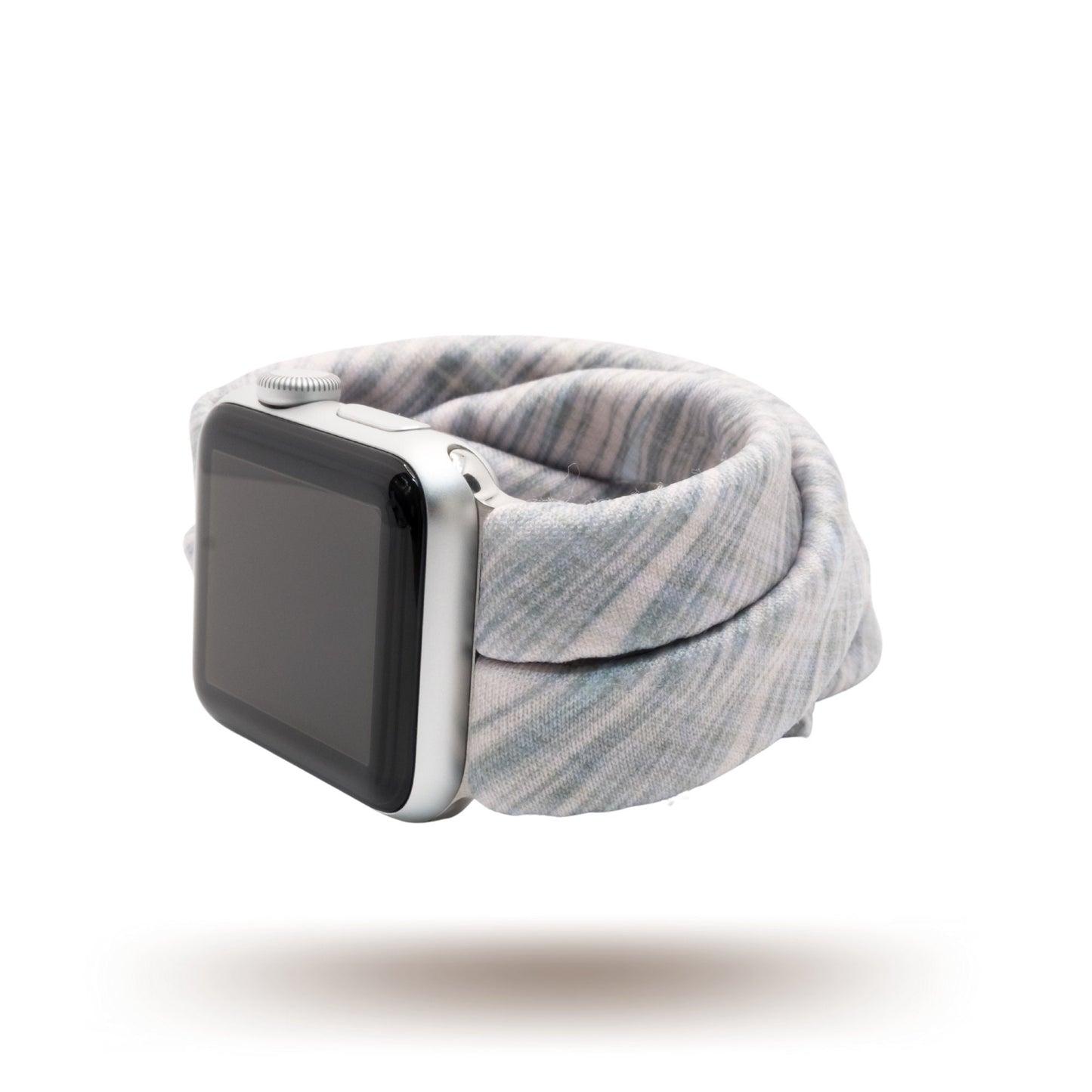Crosshatch Pink Yoga Band® featuring a subtle crosshatch pattern on light pink fabric. A breathable, stretchy watch strap with a patent-pending design compatible with Apple Watch, Fitbit, and Samsung Galaxy models.