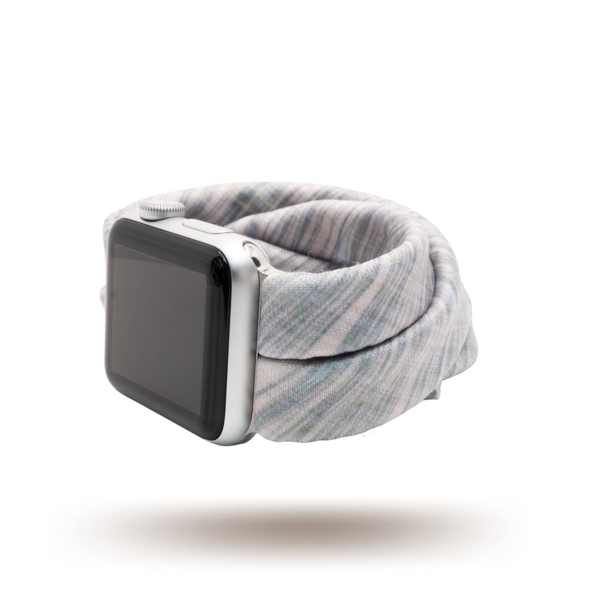 Crosshatch Pink Yoga Band® featuring a subtle crosshatch pattern on light pink fabric. A breathable, stretchy watch strap with a patent-pending design compatible with Apple Watch, Fitbit, and Samsung Galaxy models.