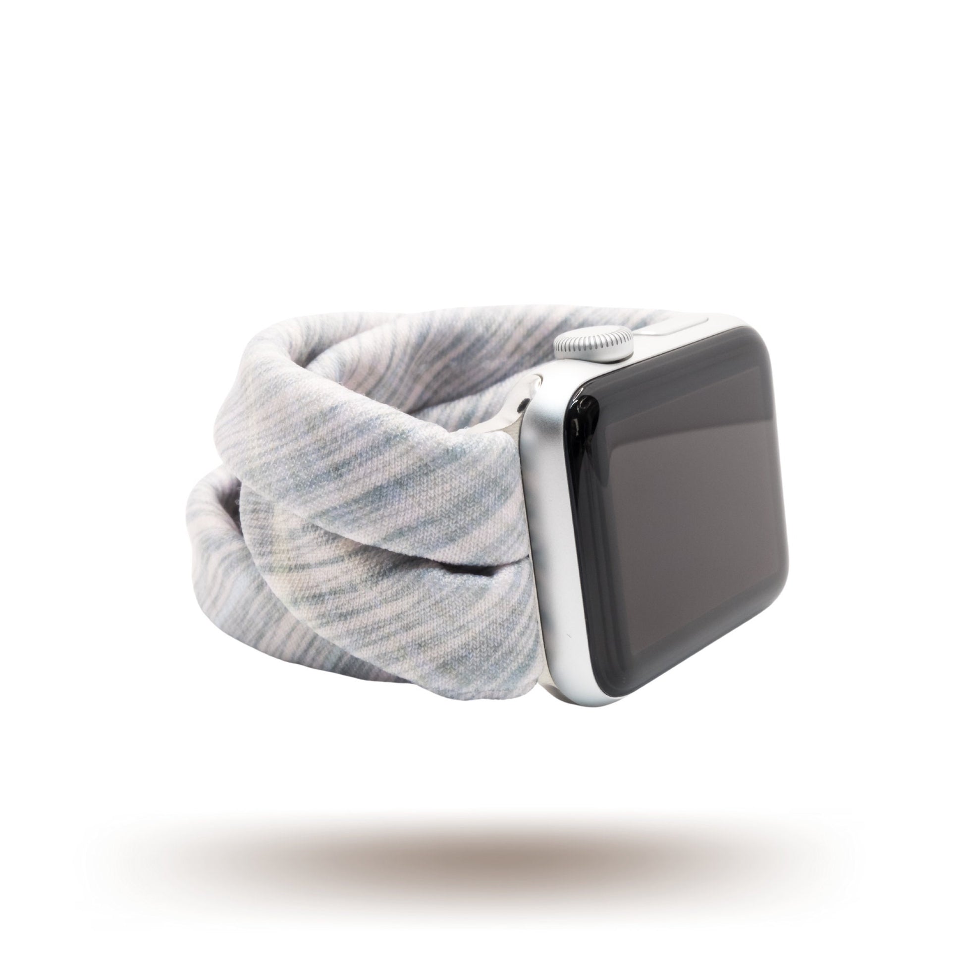 Crosshatch Pink Yoga Band® featuring a subtle crosshatch pattern on light pink fabric. A breathable, stretchy watch strap with a patent-pending design compatible with Apple Watch, Fitbit, and Samsung Galaxy models.
