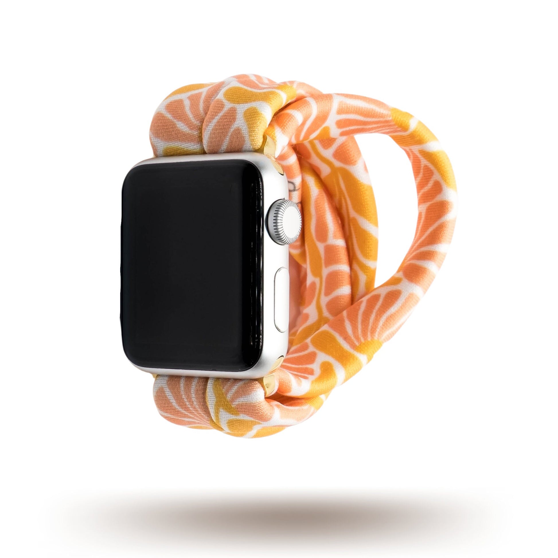 Flower Market Yoga Band® featuring a vibrant pink, orange, and white floral pattern. A breathable, stretchy watch strap with a patent-pending design compatible with Apple Watch, Fitbit, and Samsung Galaxy models.
