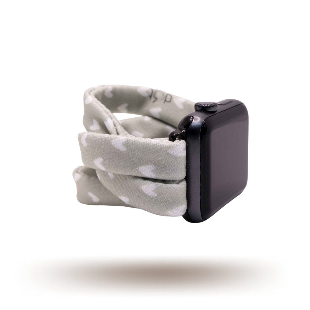 Fulfillment House Yoga Band® featuring a sweet heart print on a grey fabric background. A breathable, stretchy watch strap with a patent-pending design compatible with Apple Watch, Fitbit, and Samsung Galaxy models.