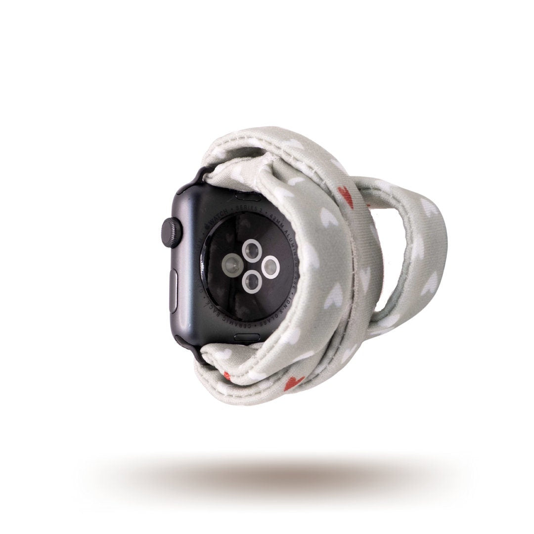 Fulfillment House Yoga Band® featuring a sweet heart print on a grey fabric background. A breathable, stretchy watch strap with a patent-pending design compatible with Apple Watch, Fitbit, and Samsung Galaxy models.