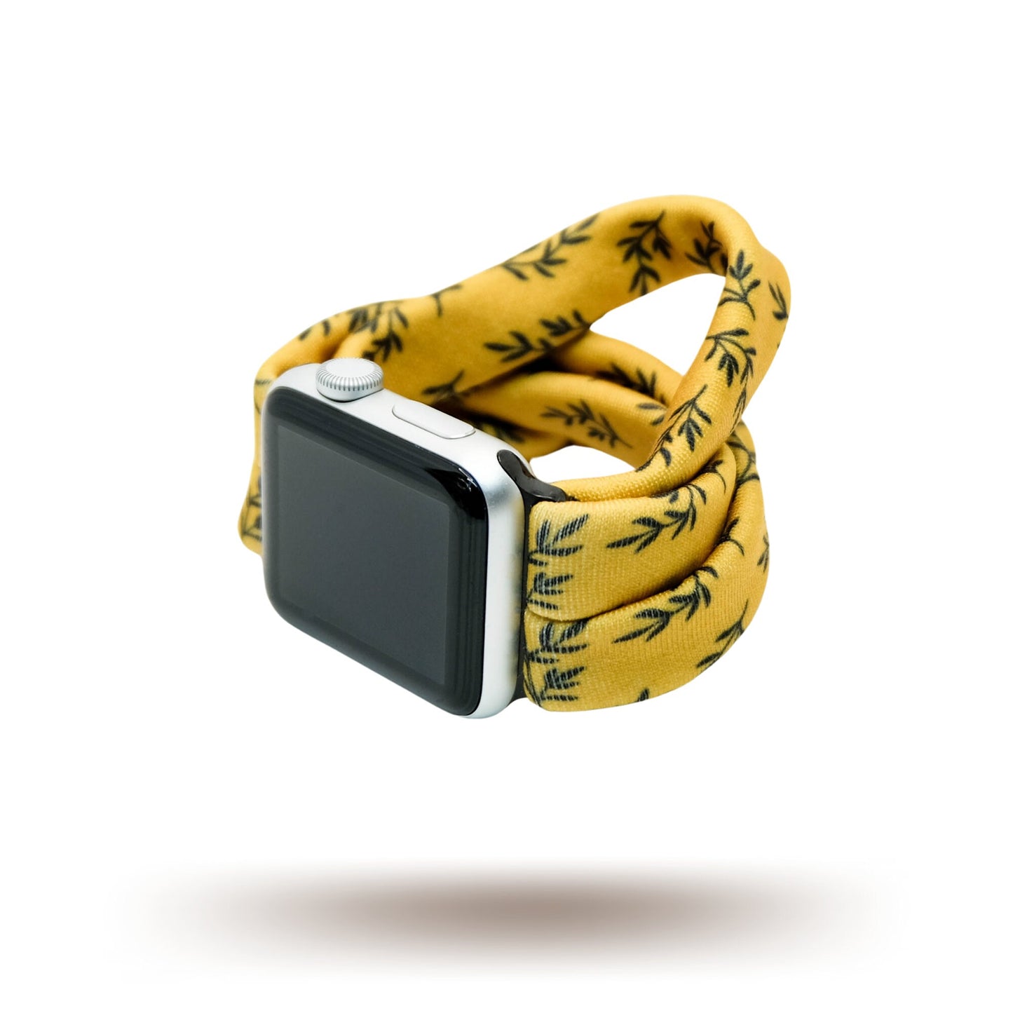 Golden Laurel Yoga Band® featuring a delicate black laurel leaf print on a vibrant goldenrod fabric. A breathable, stretchy watch strap with a patent-pending design compatible with Apple Watch, Fitbit, and Samsung Galaxy models.