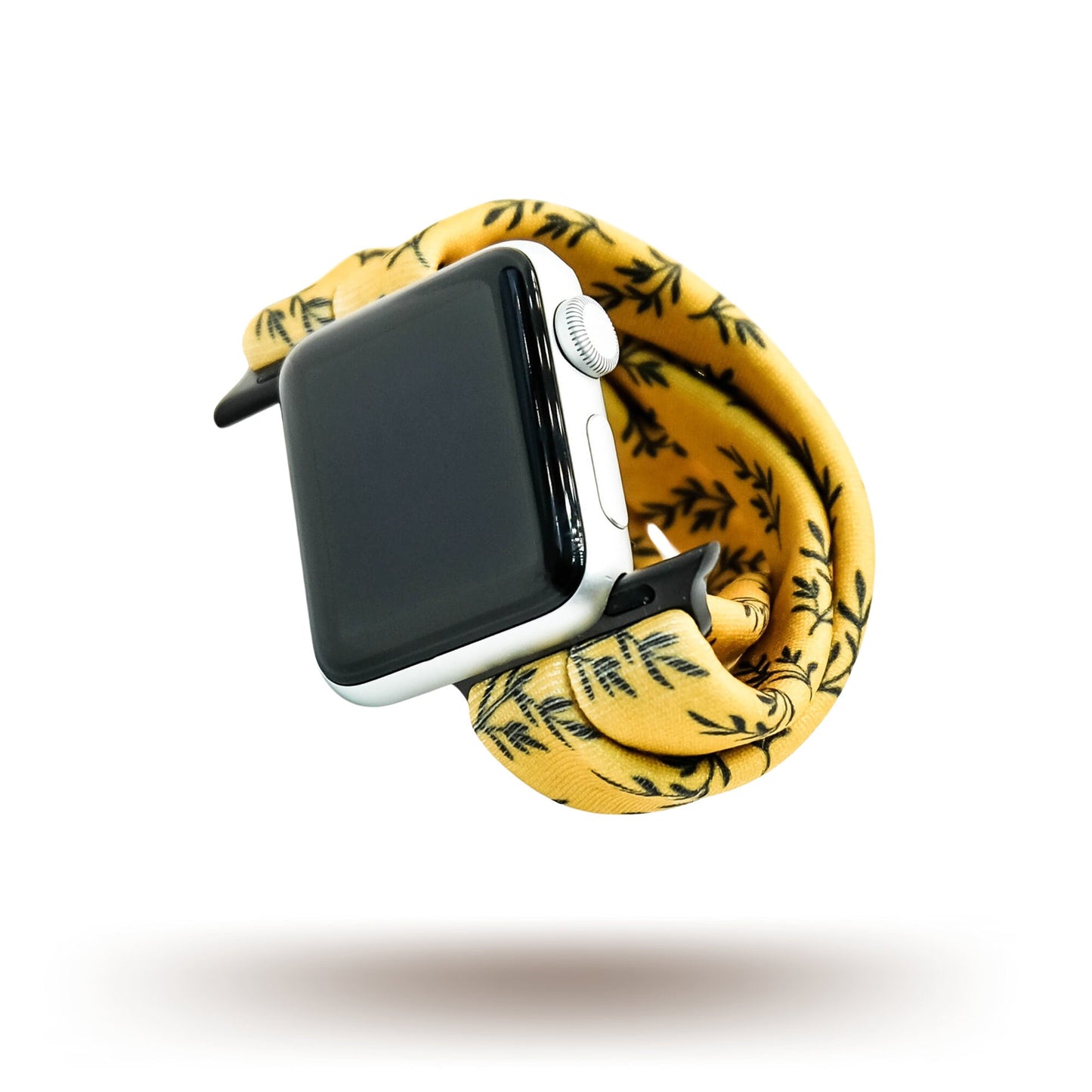 Golden Laurel Yoga Band® featuring a delicate black laurel leaf print on a vibrant goldenrod fabric. A breathable, stretchy watch strap with a patent-pending design compatible with Apple Watch, Fitbit, and Samsung Galaxy models.