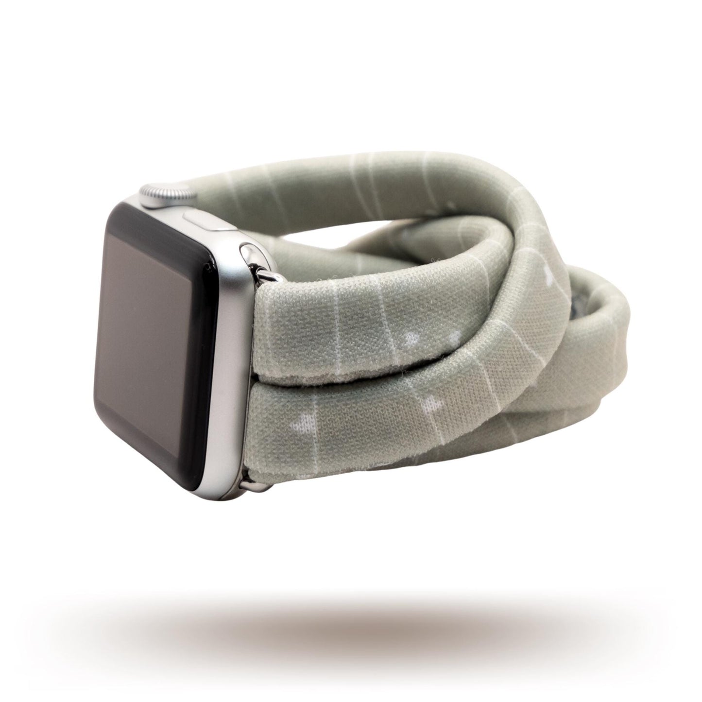 Gray Heartstrings Yoga Band® featuring a delicate string pattern with tiny hearts on a gray fabric. A breathable, stretchy watch strap with a patent-pending design compatible with Apple Watch, Fitbit, and Samsung Galaxy models.