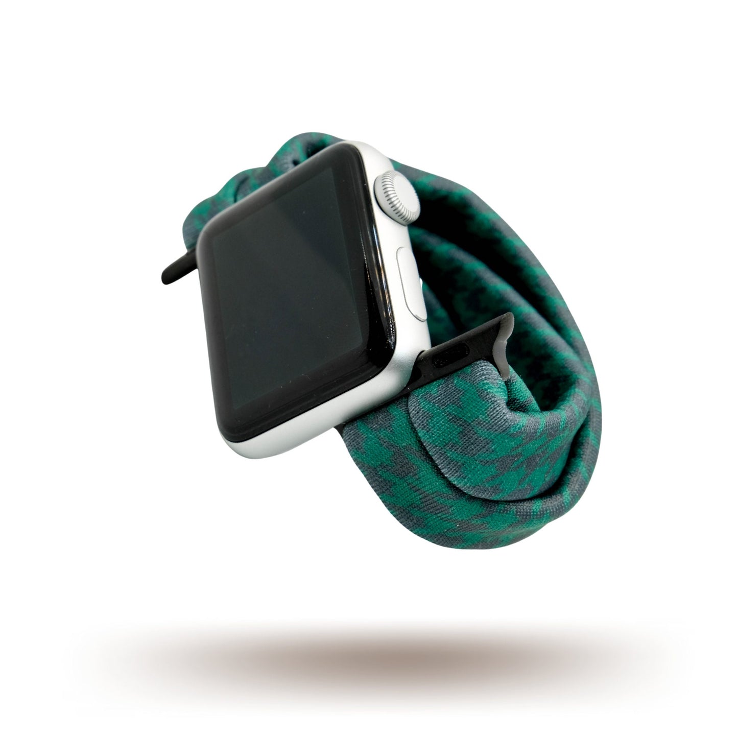 Green Houndstooth Yoga Band® in a classic forest green and black pattern. A breathable, stretchy watch strap with a patent-pending design compatible with Apple Watch, Fitbit, and Samsung Galaxy models.