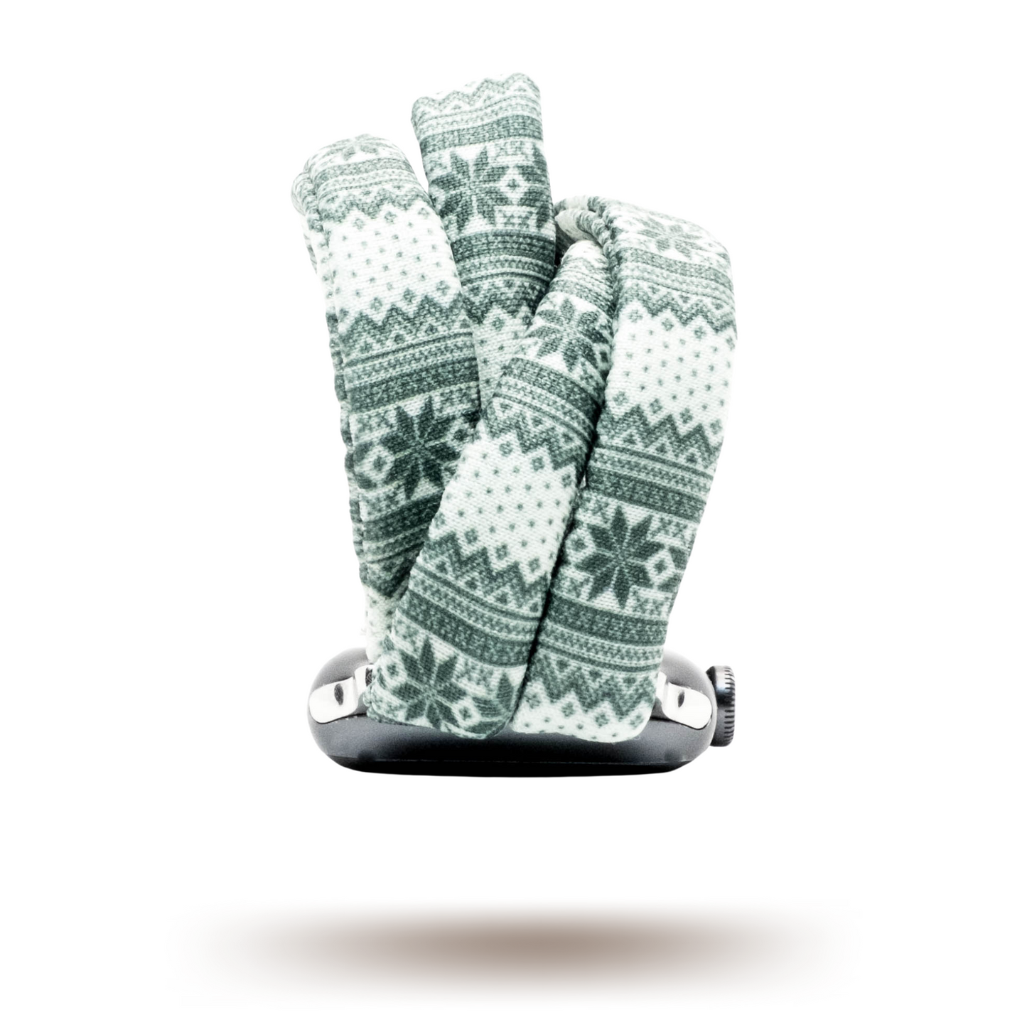 Green Nordic Sweater Yoga Band® featuring a green and white alpine snowflake print. A breathable, stretchy watch strap with a patent-pending design compatible with Apple Watch, Fitbit, and Samsung Galaxy models.