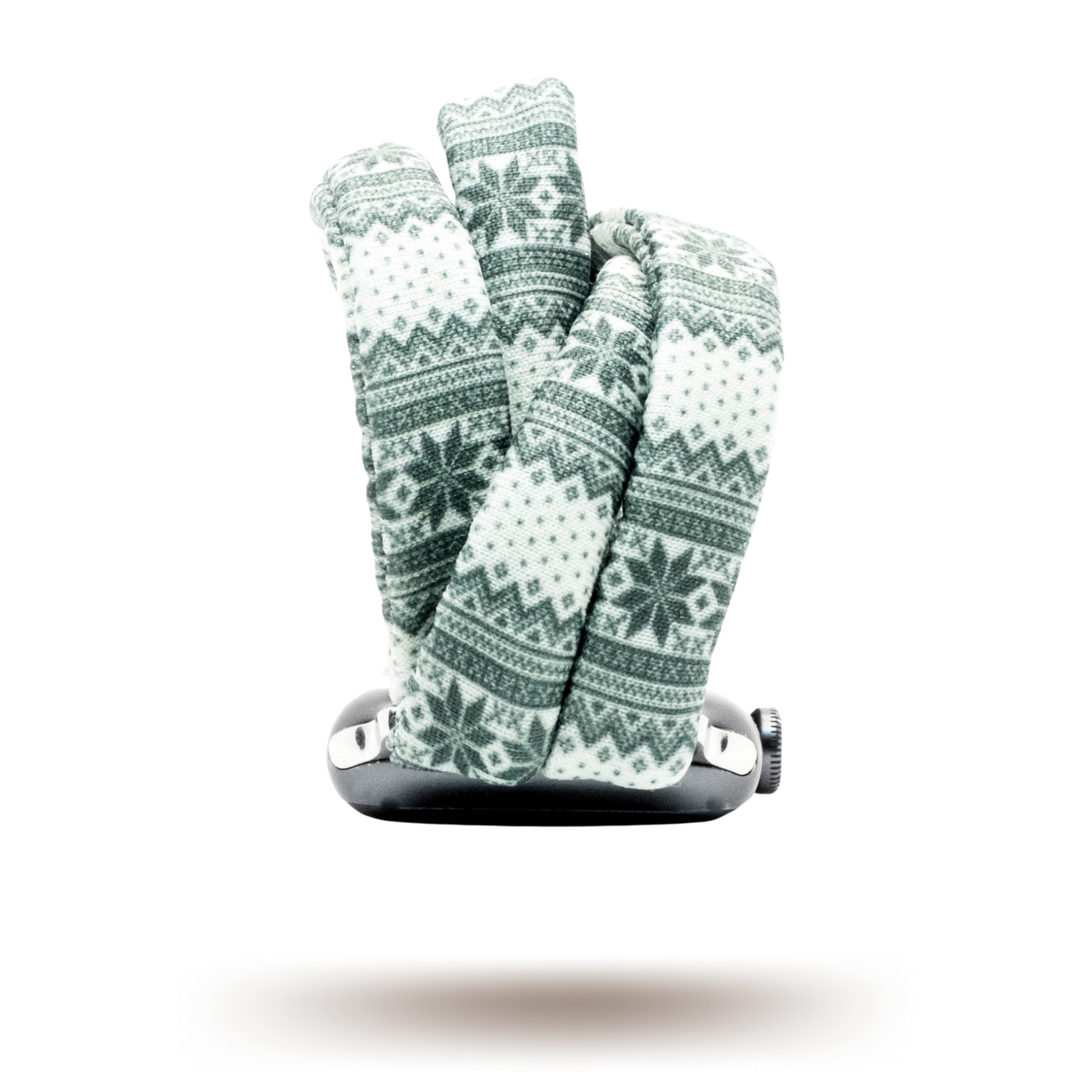 Green Nordic Sweater Yoga Band® featuring a green and white alpine snowflake print. A breathable, stretchy watch strap with a patent-pending design compatible with Apple Watch, Fitbit, and Samsung Galaxy models.