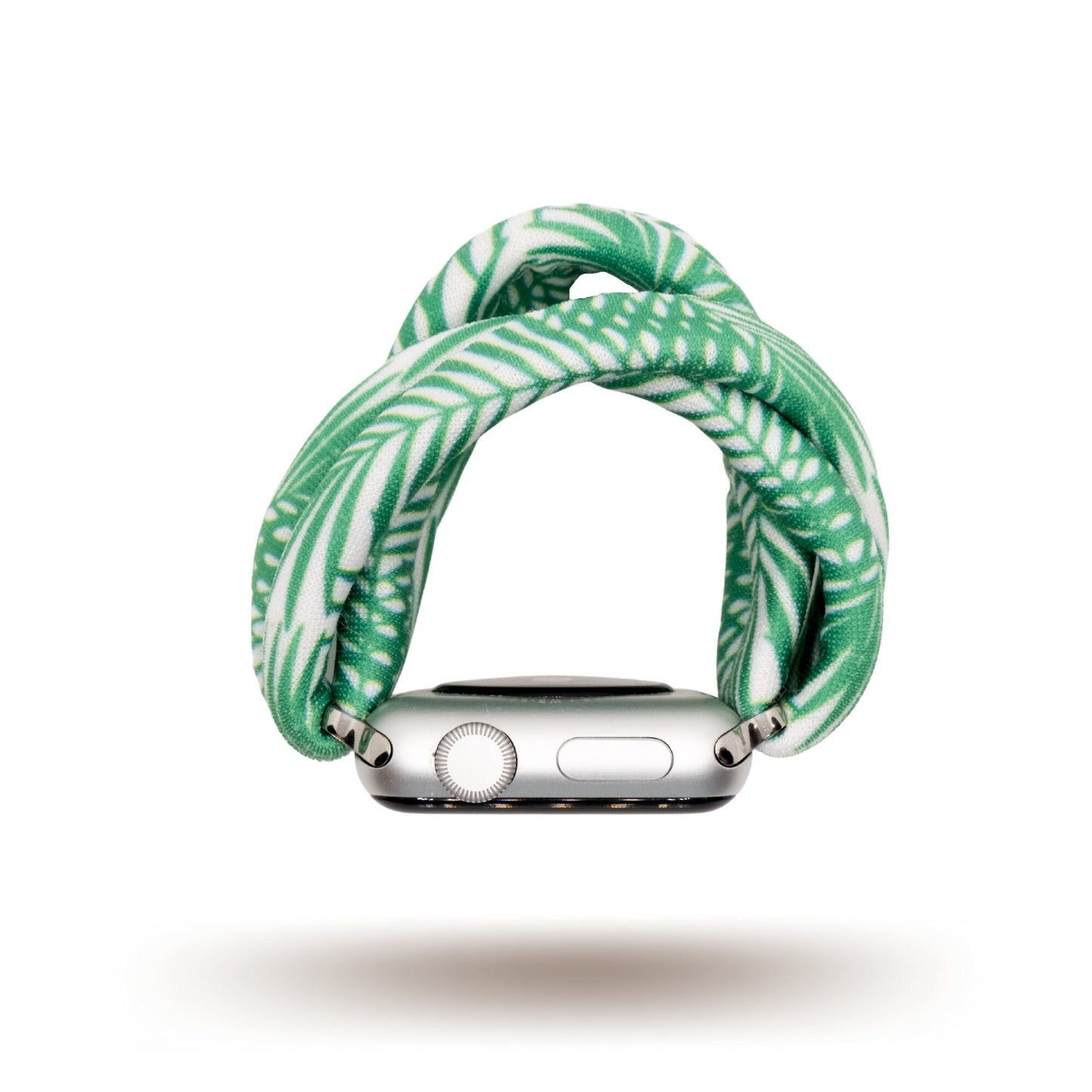Green Palms Yoga Band® featuring a green and white tropical palm frond print. A breathable, stretchy fabric watch strap with a patent-pending design compatible with Apple Watch, Fitbit, and Samsung Galaxy models.