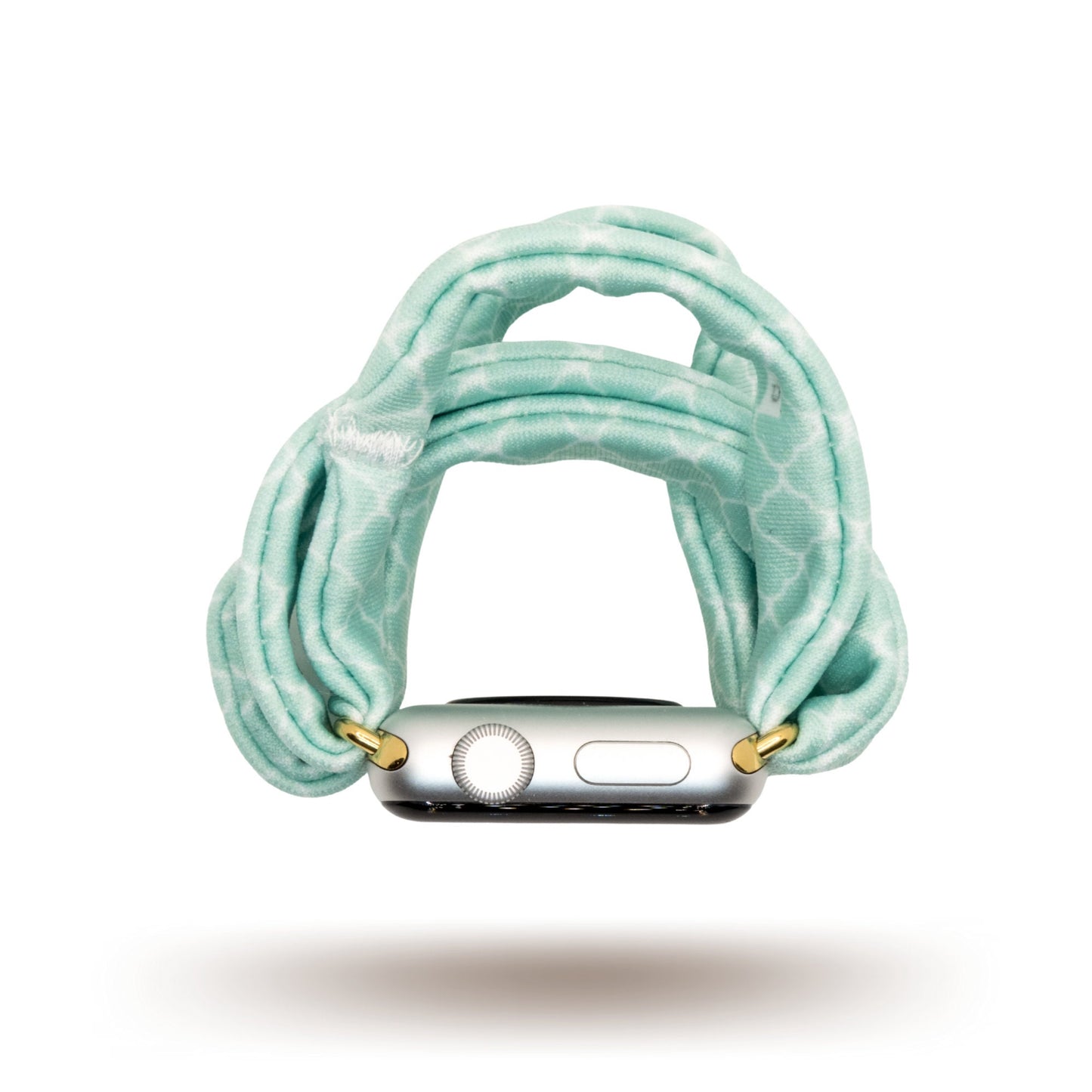 Green Quatrefoil Yoga Band® featuring a classic light green and white geometric pattern. A breathable, stretchy watch strap with a patent-pending design compatible with Apple Watch, Fitbit, and Samsung Galaxy models.
