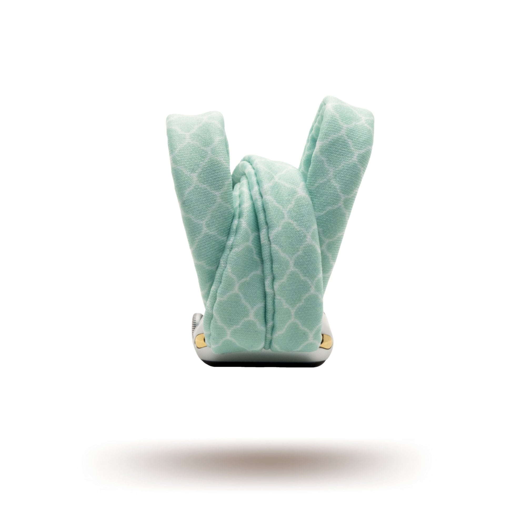 Green Quatrefoil Yoga Band® featuring a classic light green and white geometric pattern. A breathable, stretchy watch strap with a patent-pending design compatible with Apple Watch, Fitbit, and Samsung Galaxy models.