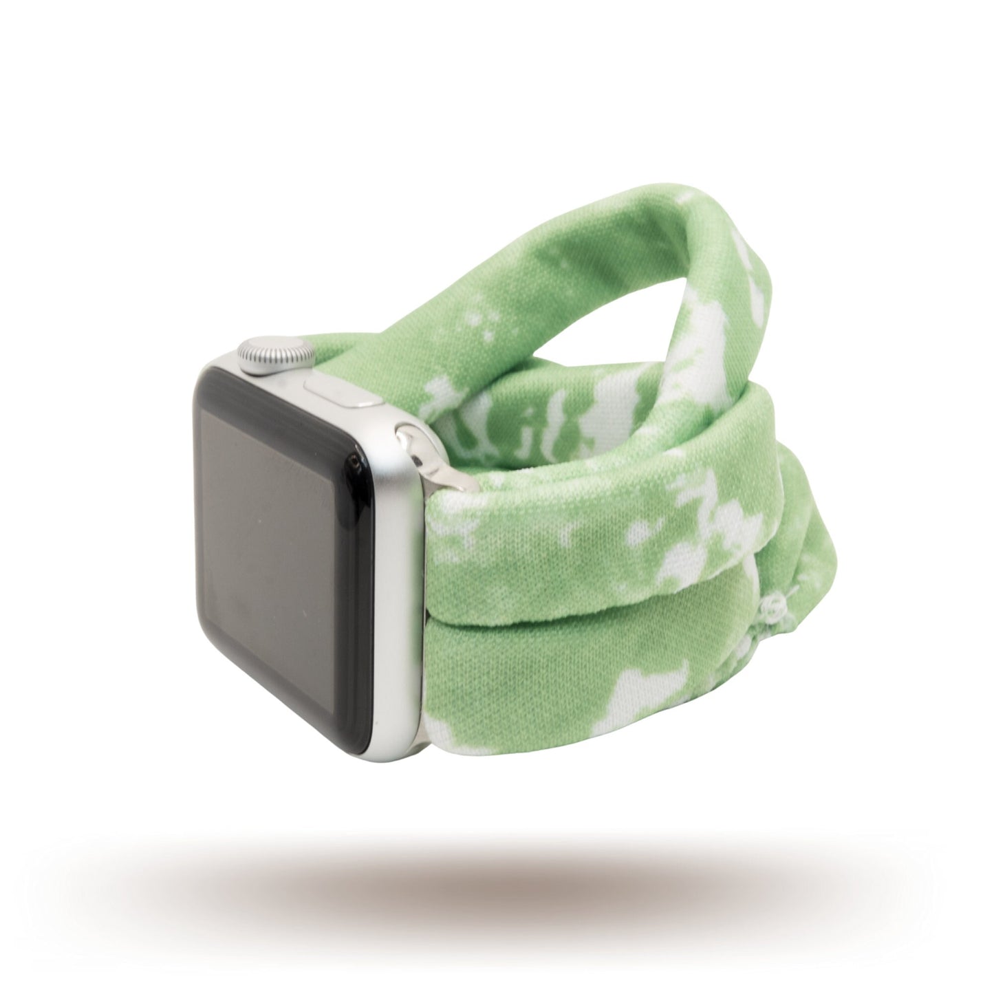 Green Tie Dye Yoga Band® featuring a swirling green and white batik pattern. A breathable, stretchy fabric watch strap with a patent-pending design compatible with Apple Watch, Fitbit, and Samsung Galaxy models.