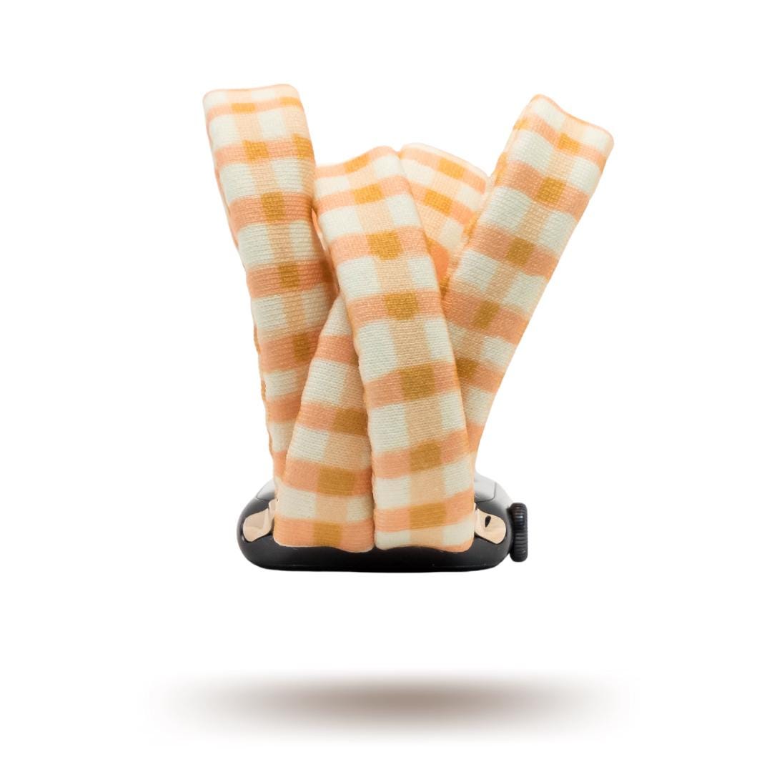 Harvest Plaid Yoga Band® featuring an earthy yellow and orange plaid pattern. A breathable, stretchy fabric watch strap with a patent-pending design compatible with Apple Watch, Fitbit, and Samsung Galaxy models.