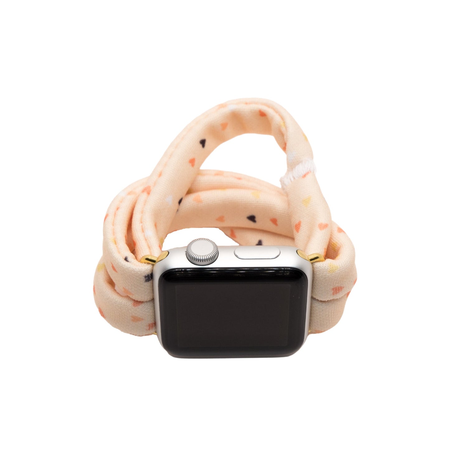 Heartbeat Yoga Band® featuring a tiny heart print in peach, cream, and pink tones. A breathable, stretchy fabric watch strap with a patent-pending design compatible with Apple Watch, Fitbit, and Samsung Galaxy models.