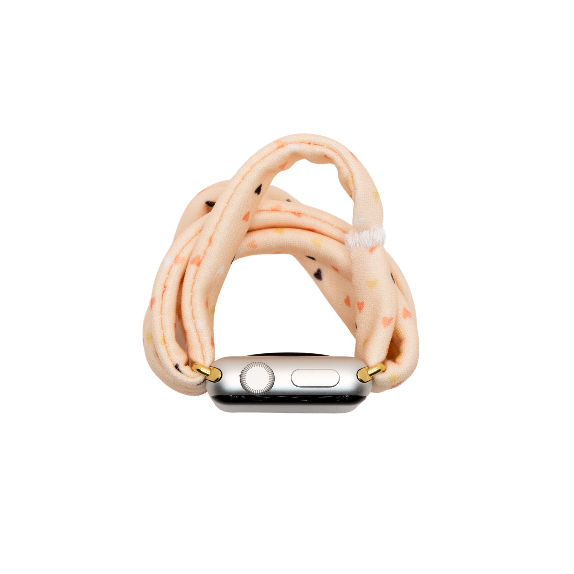 Heartbeat Yoga Band® featuring a tiny heart print in peach, cream, and pink tones. A breathable, stretchy fabric watch strap with a patent-pending design compatible with Apple Watch, Fitbit, and Samsung Galaxy models.
