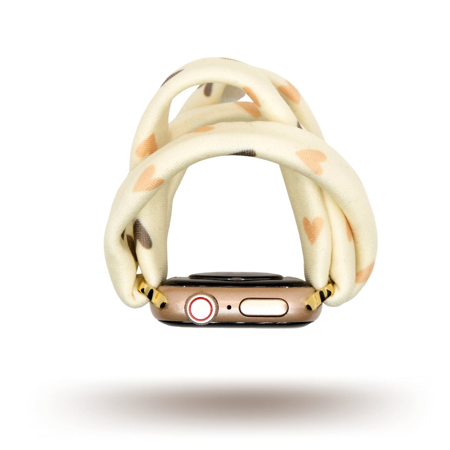 Hearts and Cream Yoga Band® featuring a tan and brown heart print on a cream fabric background. A breathable, stretchy watch strap with a patent-pending design compatible with Apple Watch, Fitbit, and Samsung Galaxy models.