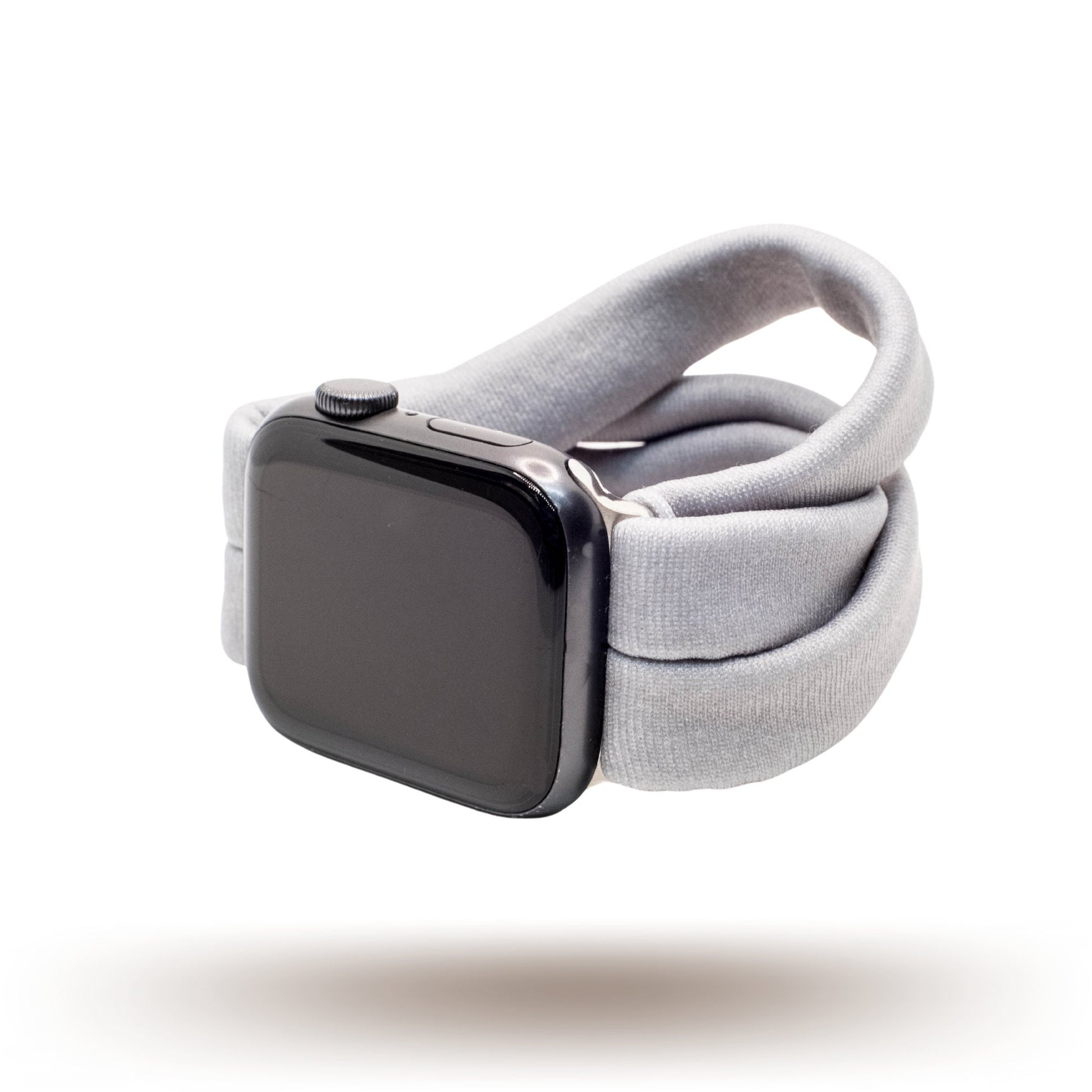 Solid Gray Yoga Band® in a neutral heather gray knit fabric. A breathable, stretchy watch strap with a patent-pending design compatible with Apple Watch, Fitbit, and Samsung Galaxy models.
